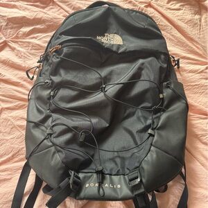 The North Face Black and Gold Backpack